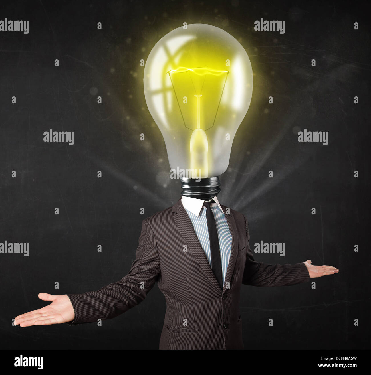 Business man with light bulb head concept Stock Photo - Alamy