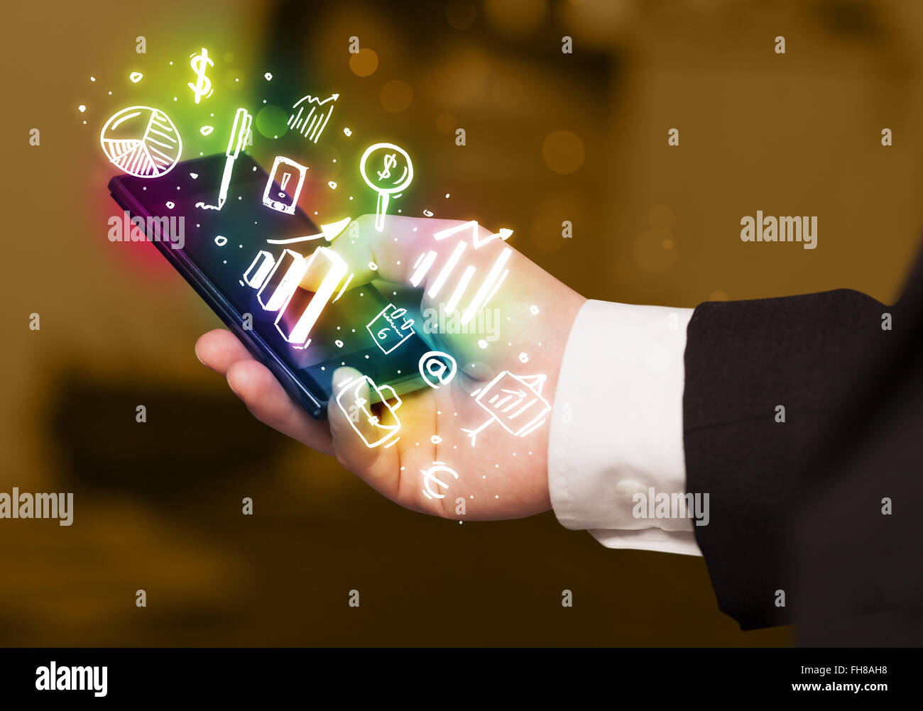 Smartphone with finance and market icons and symbols Stock Photo