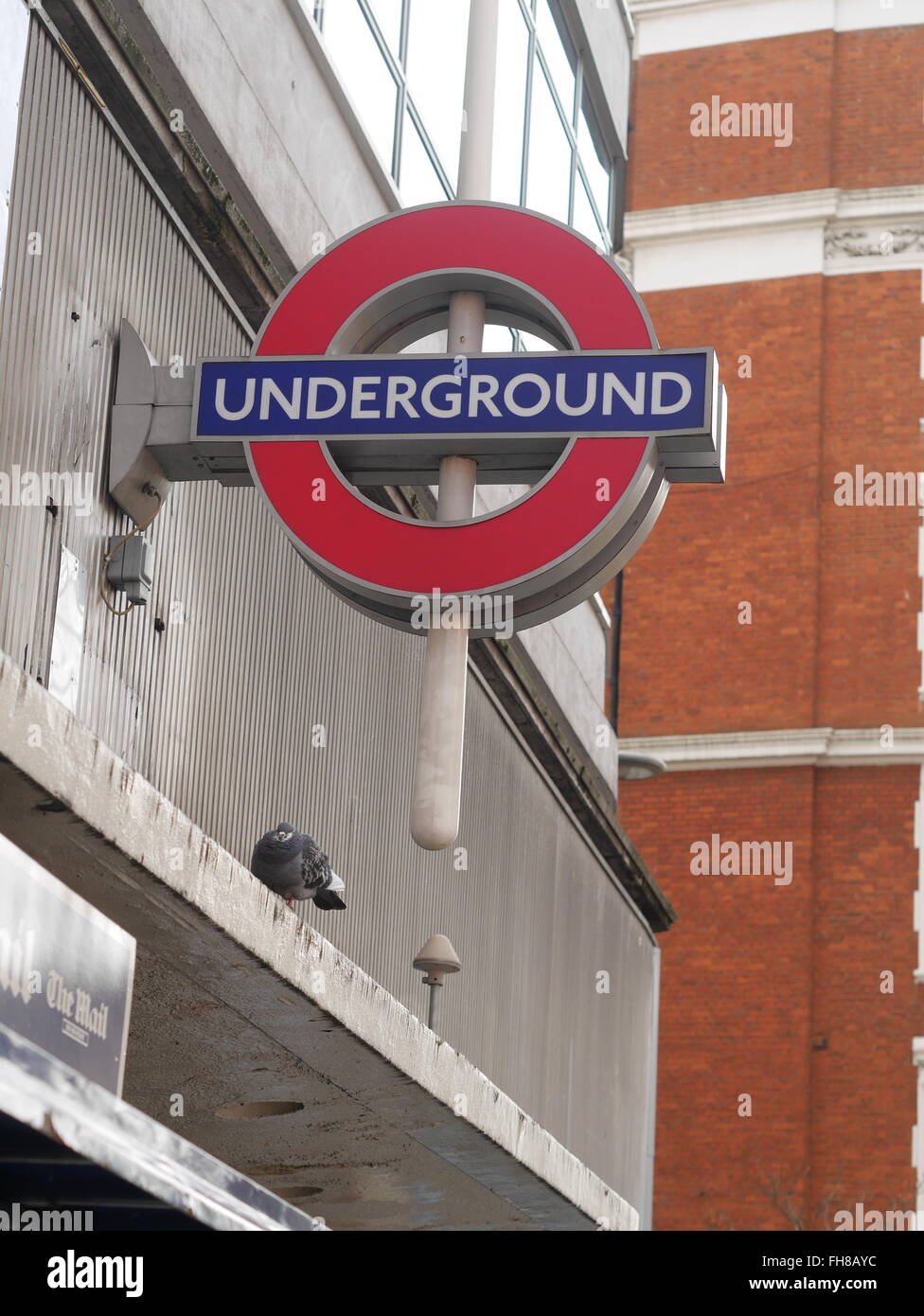 A London Underground sign outside SloAne Square tube station Stock Photo