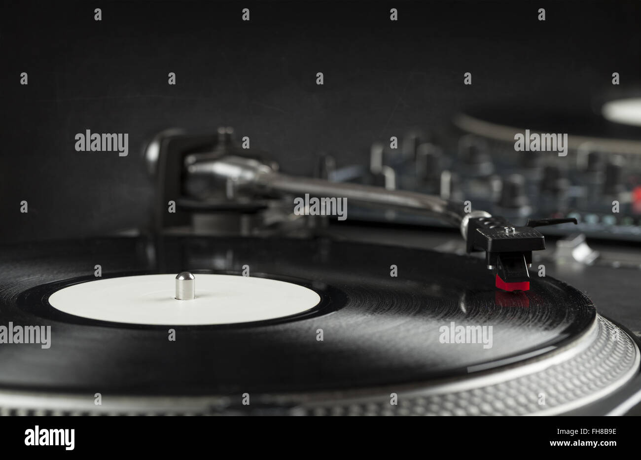 Turntable playing vinyl close up with needle on the record Stock Photo ...