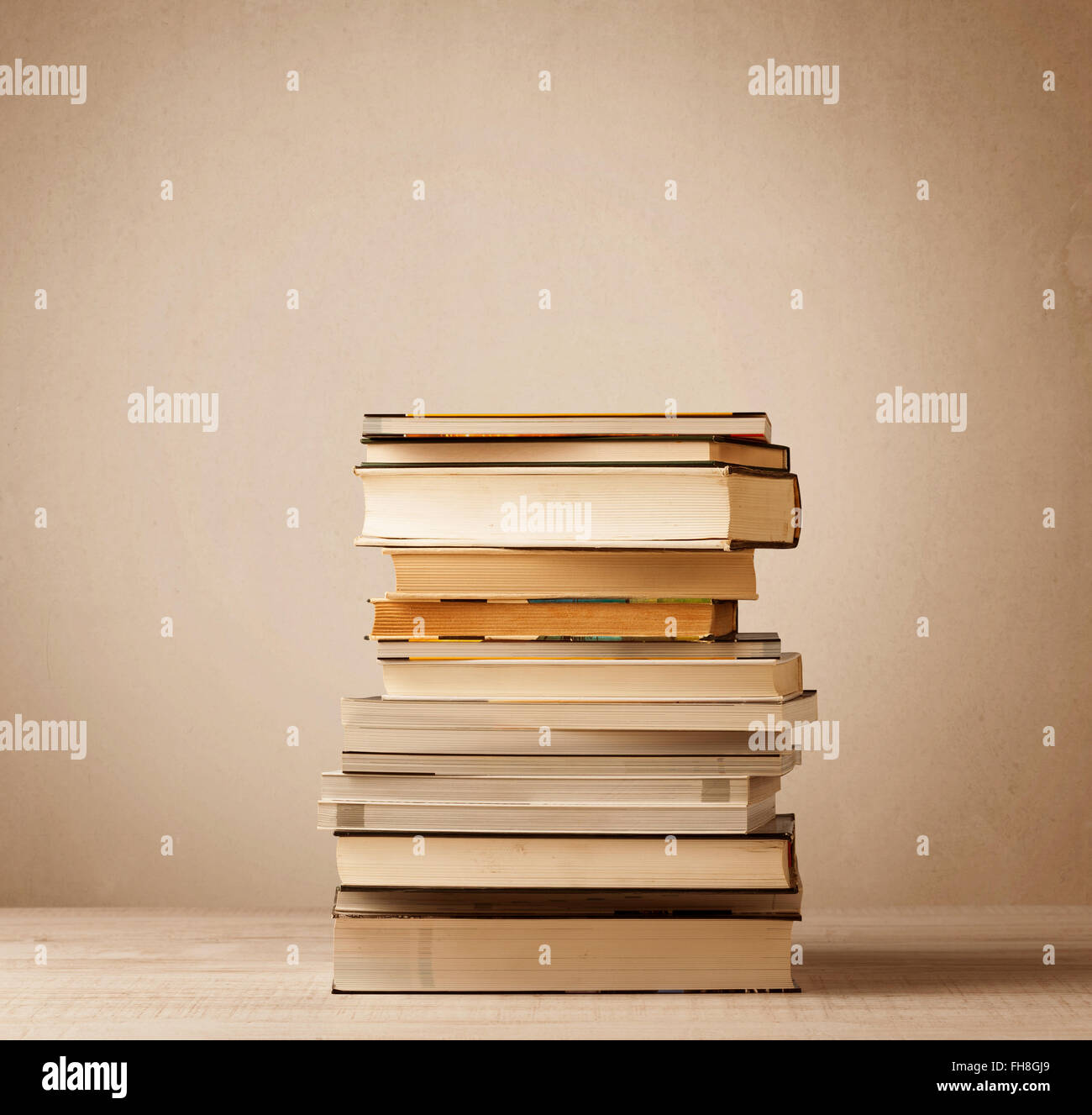 A stack of books with vintage background Stock Photo - Alamy