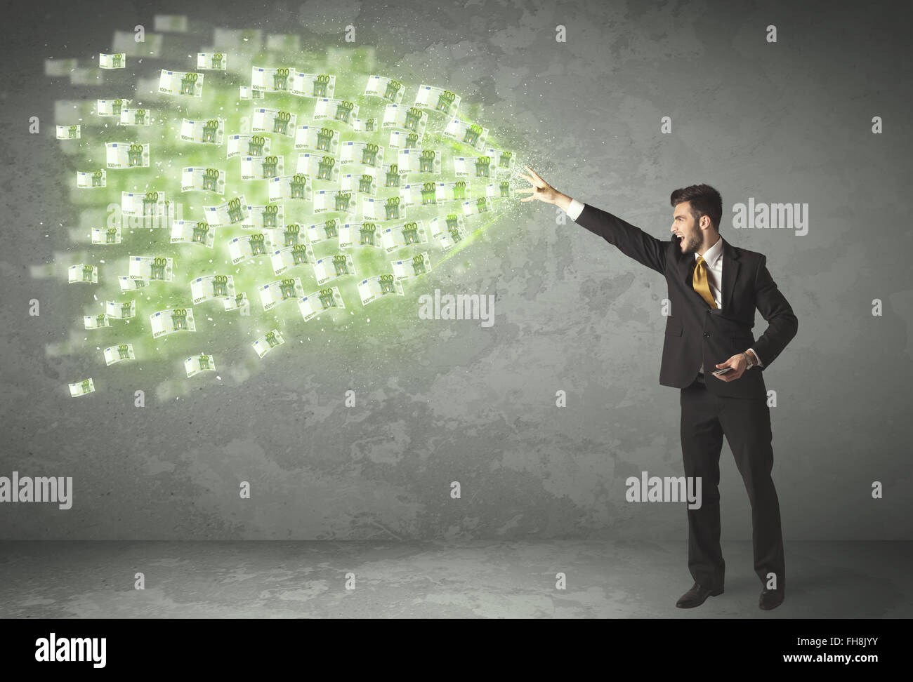 Young business person throwing money concept Stock Photo