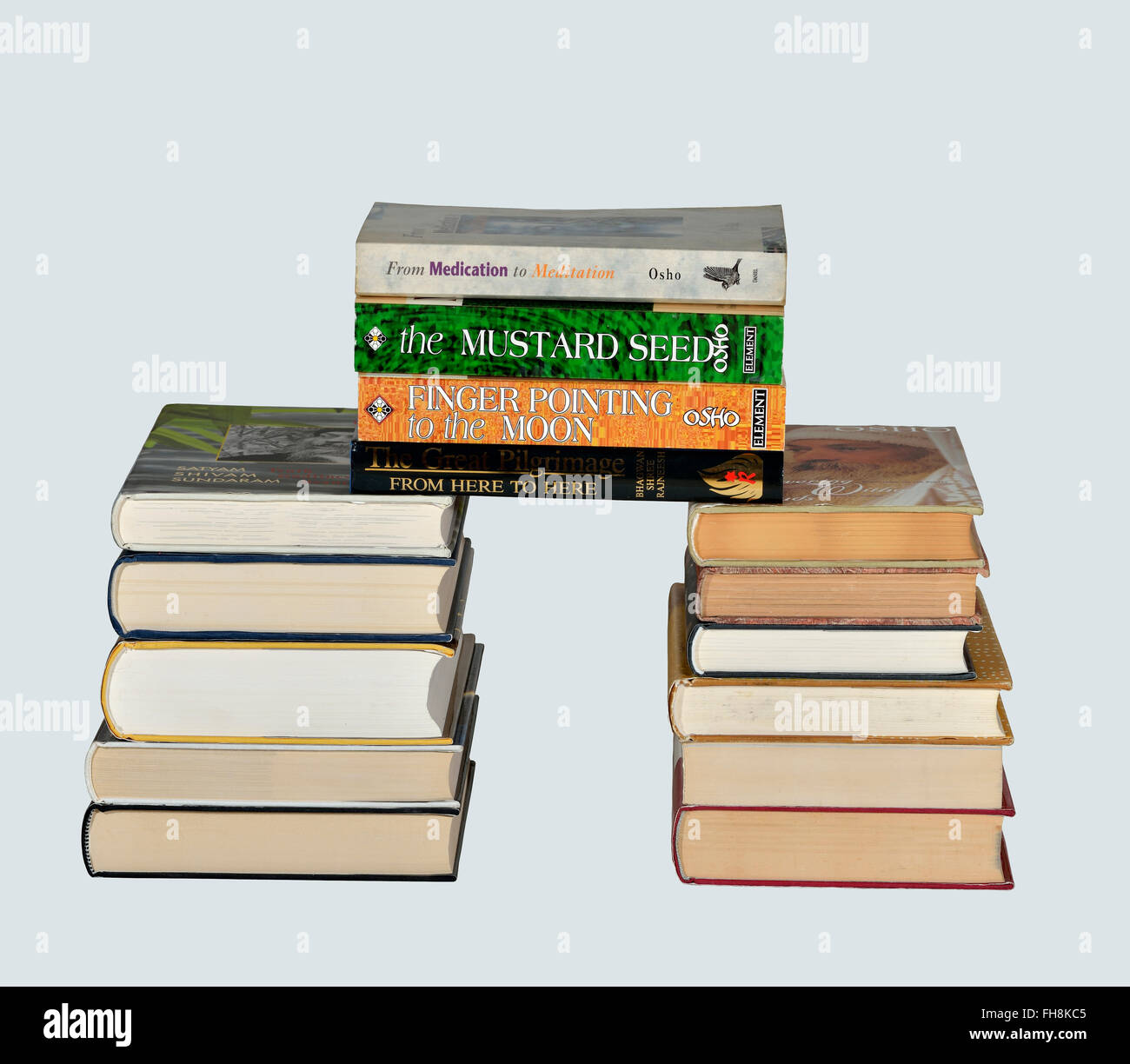Piles of Osho books Stock Photo
