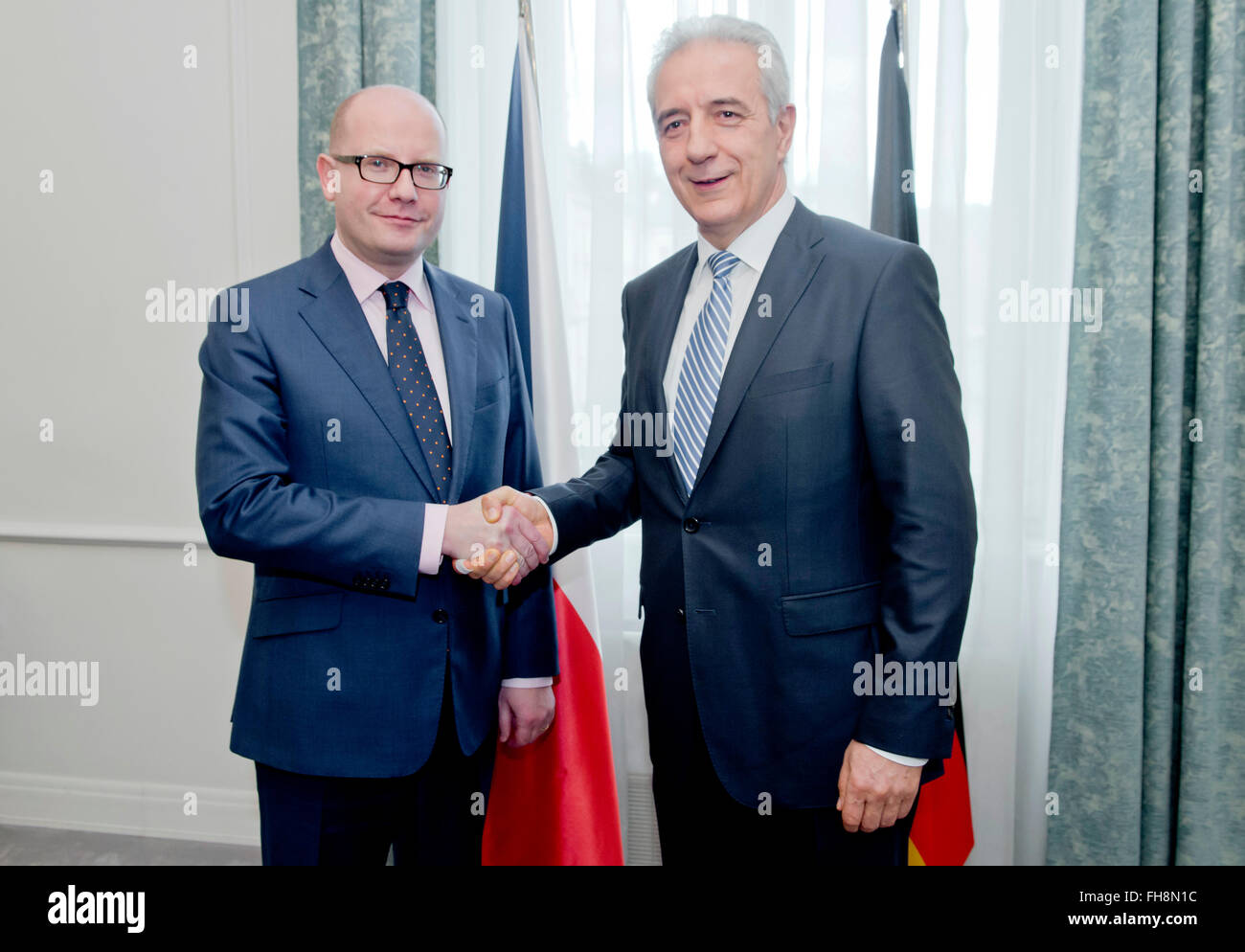 Prague, Czech Republic. 24th Feb, 2016. Czech Prime Minister Bohuslav Sobotka (left) meets chairman of Germany's Bundesrat and Saxony's Minister-President Stanislaw Tillich to discuss cross-border transport infrastructure, Czech-German cooperation in the sphere of science and investments and Czech-German strategic dialogue in Prague, Czech Republic, February 24, 2016. © Vit Simanek/CTK Photo/Alamy Live News Stock Photo