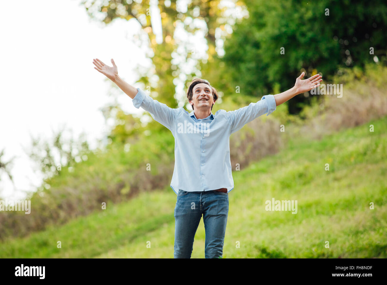 Happy adult man celebreting hi-res stock photography and images - Alamy