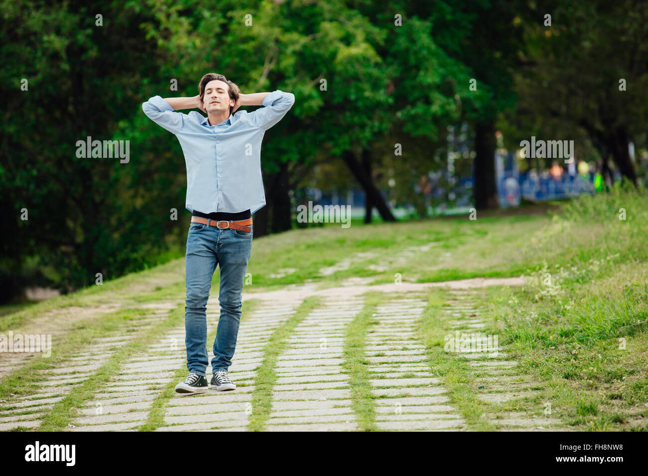 Happy teen walking alone forest hi-res stock photography and images - Alamy