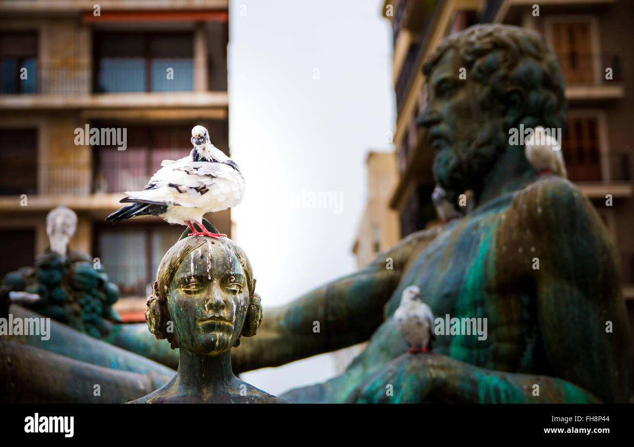 Closeup of the statue of the Turia fountain in the Plaza de la Virgen