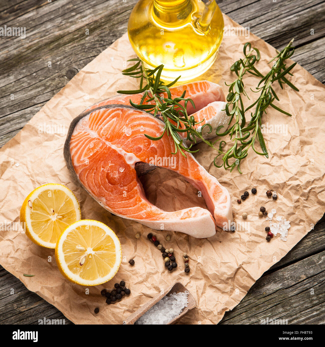 Fresh salmon on old wood Stock Photo - Alamy