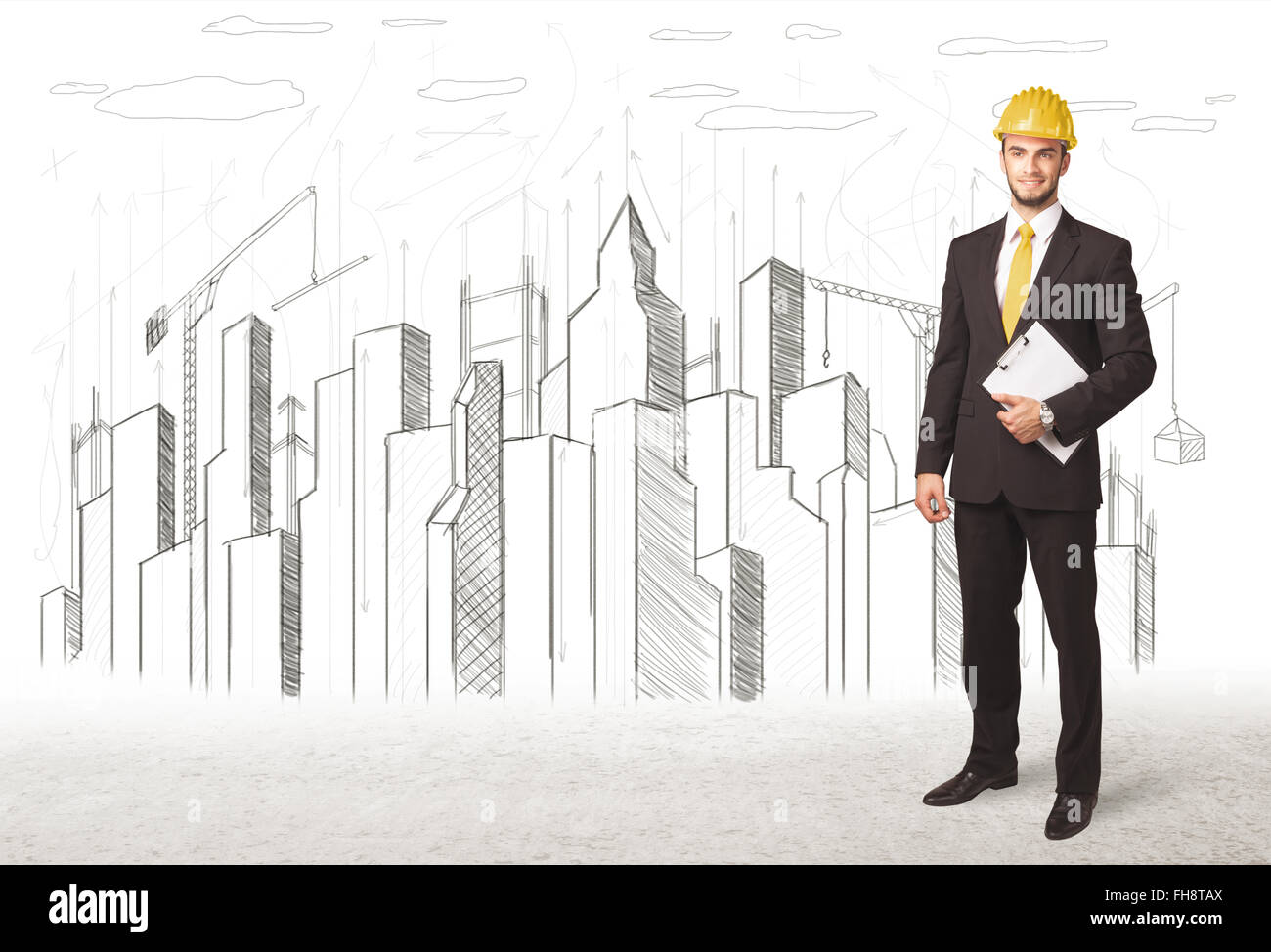 Engineer man with building city drawing in background Stock Photo