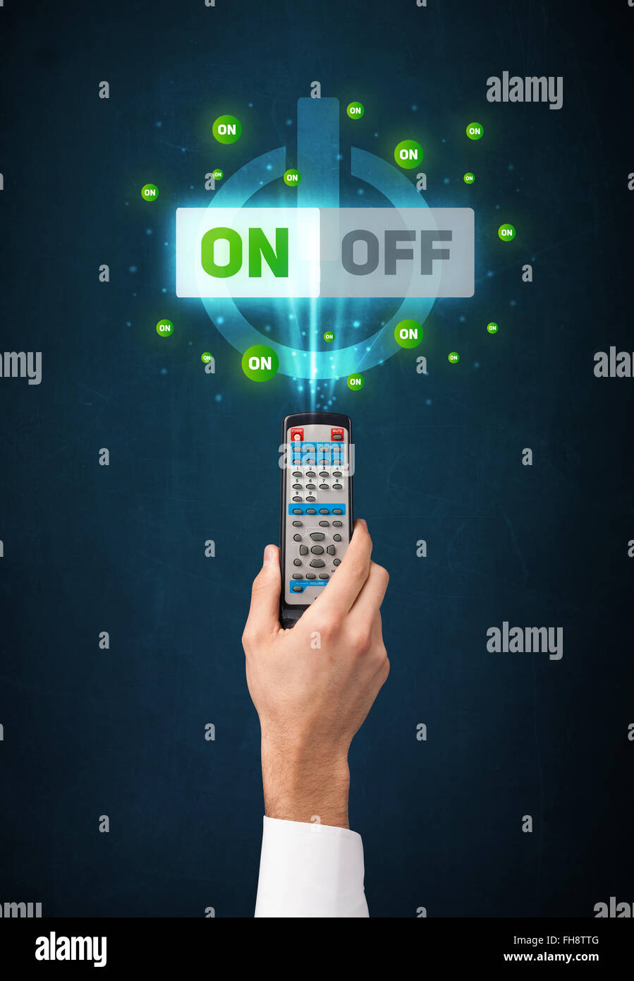 Hand with remote control and on-off signals Stock Photo - Alamy