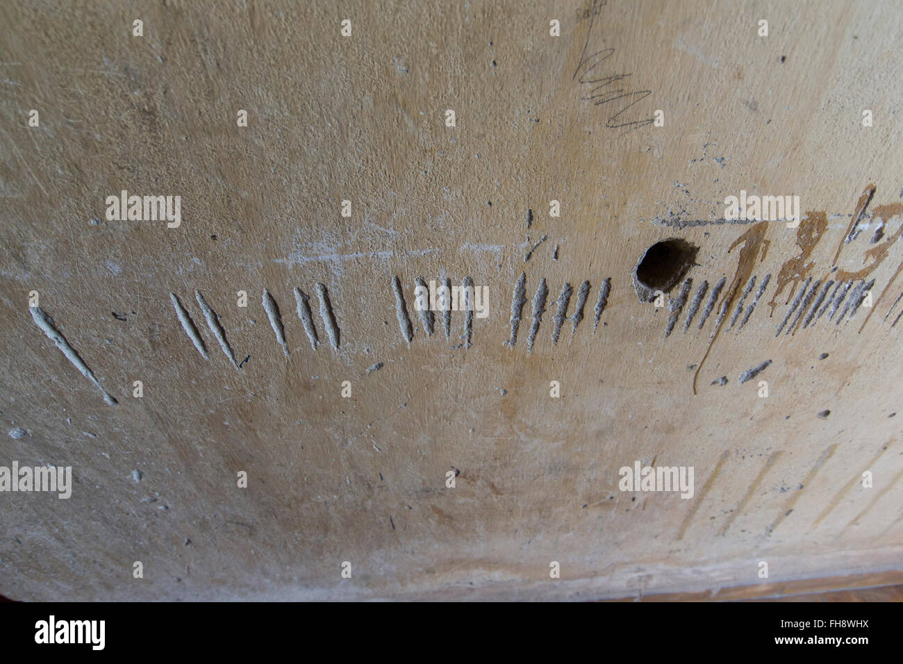 Day markings in former cell at Killing Fields memorial in Phnom Penh, Cambodia Stock Photo