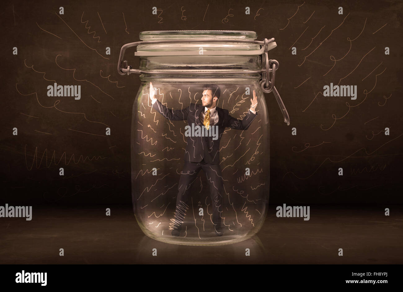 Businessman inside a jar with powerful hand drawn lines concept Stock Photo