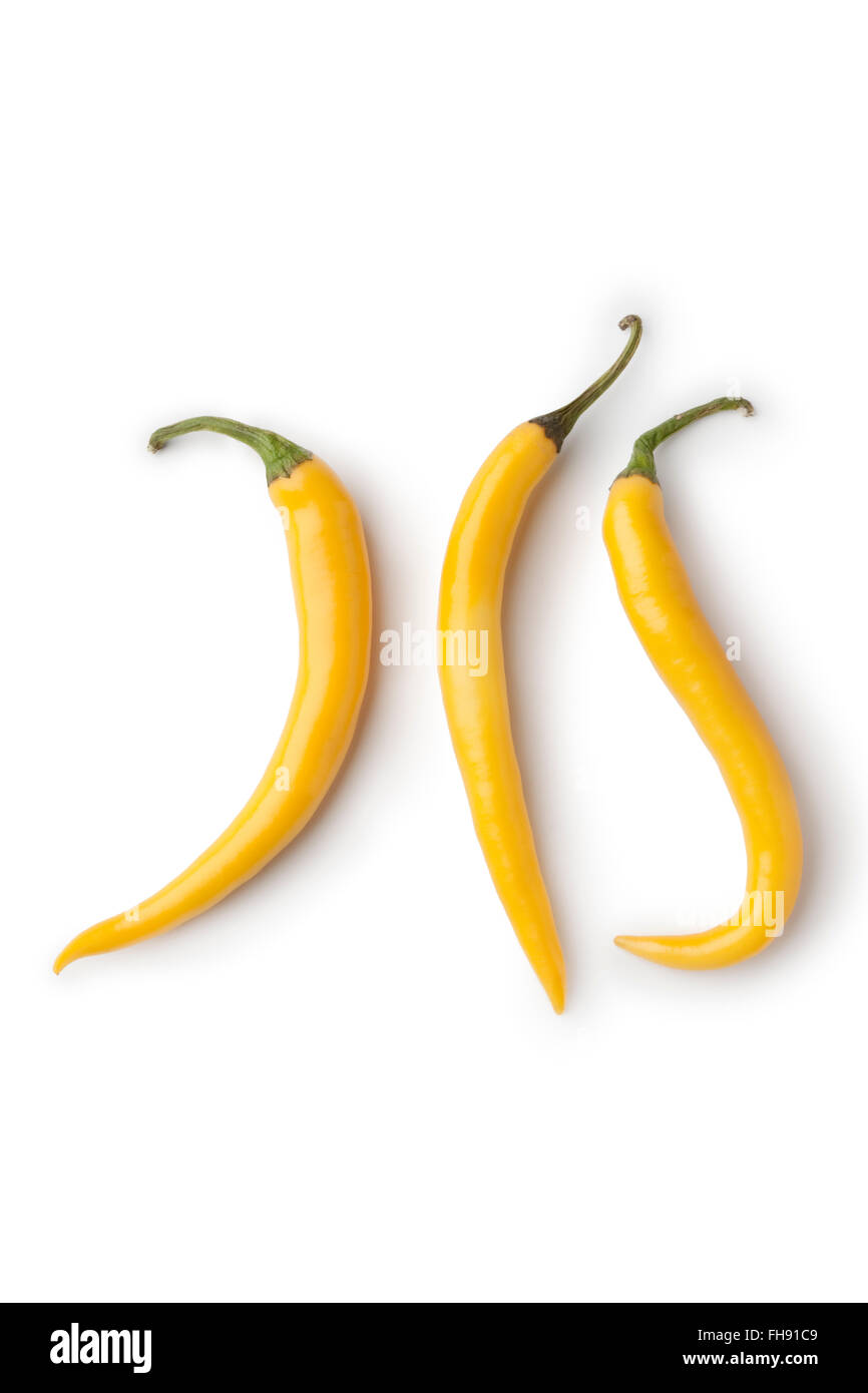 Fresh yellow hot chili peppers on white background Stock Photo - Alamy
