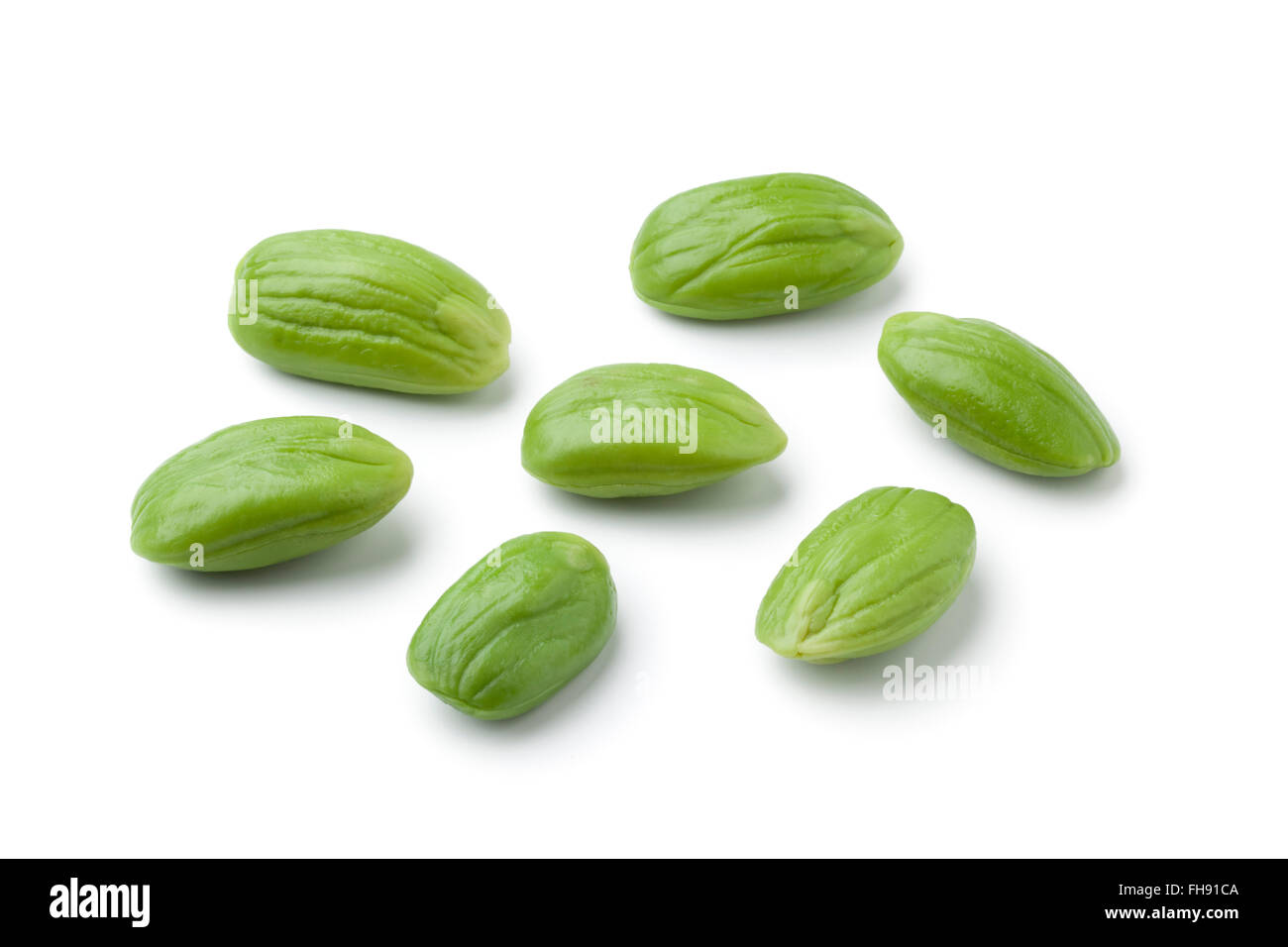 Whole fresh petai beans isolated on white background Stock Photo