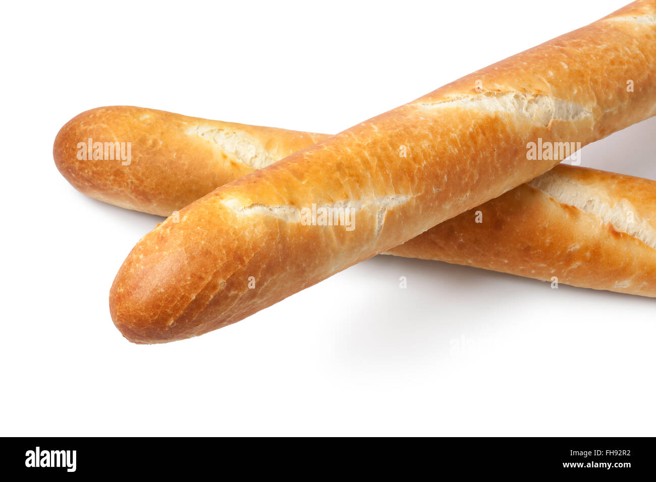 Two fresh French bread, baguettes on white background Stock Photo