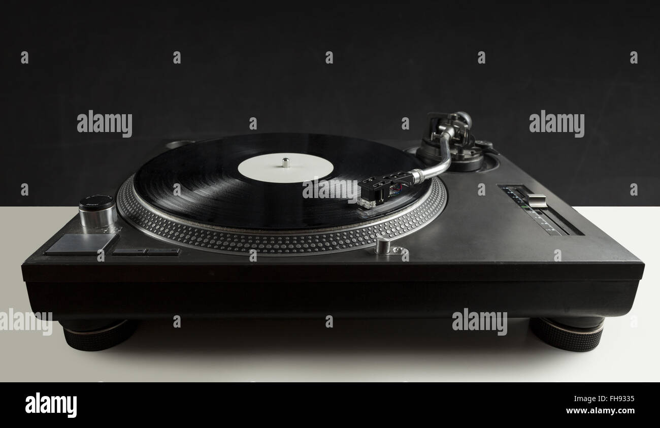 Turntable playing vinyl close up with needle on the record Stock Photo ...