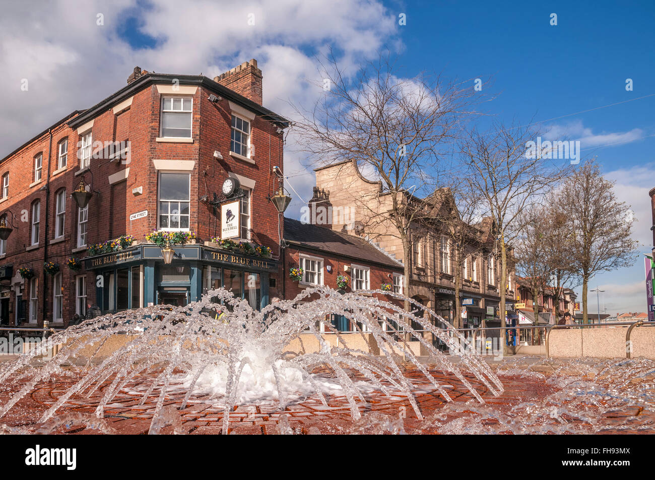 Municipal fountain Winwick street Warrington looking at the Blue Bell pub. Cheshire North West England Stock Photo