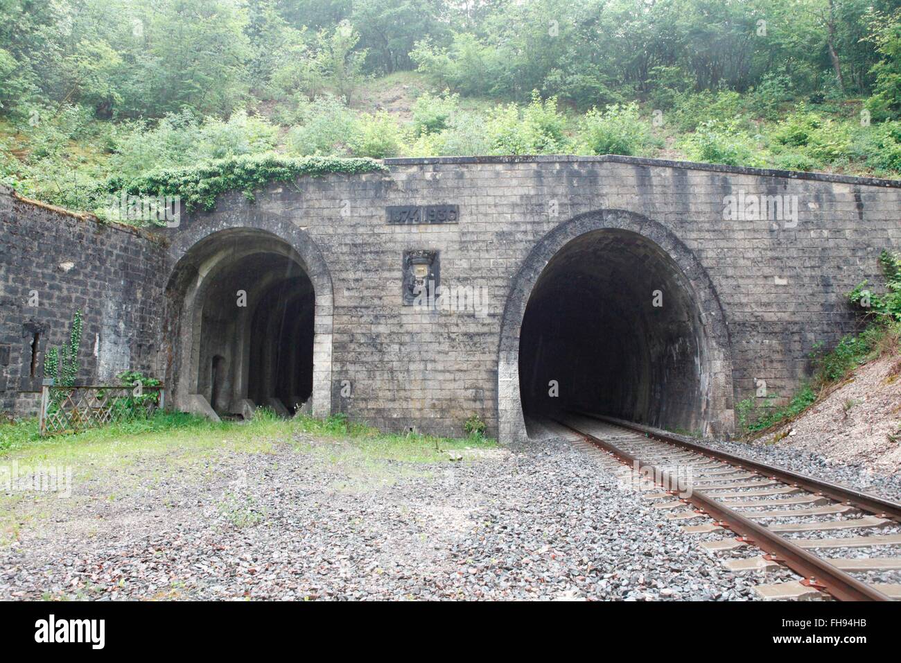 The railway tunnel of Tavannes (left tube), which served as a shelter during the battles of Verdun. The right tube was built after the Second World War. Battlefield of Verdun. June 2015. Stock Photo