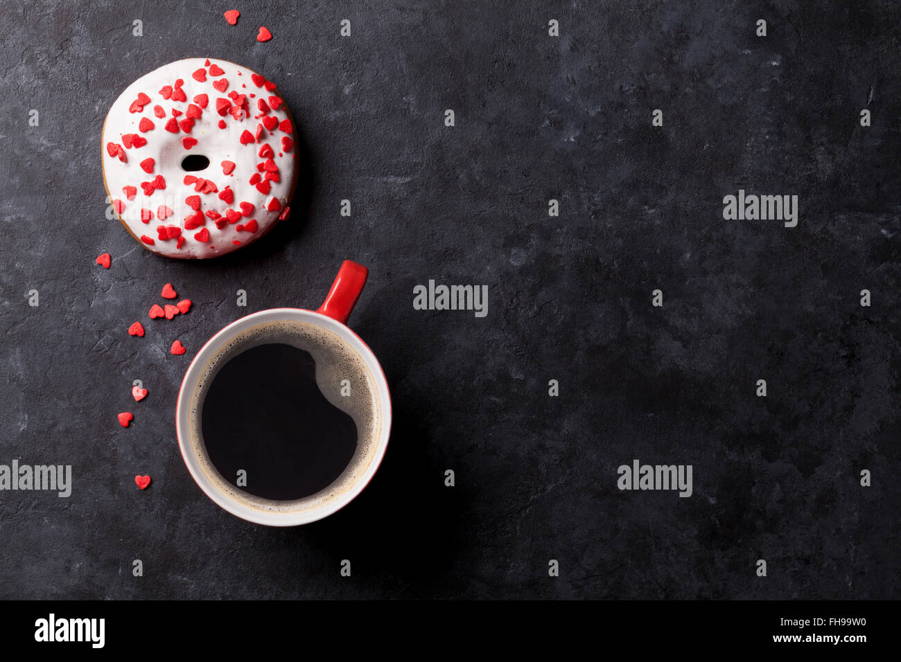 Donut and coffee on stone table. Top view with copy space Stock Photo ...