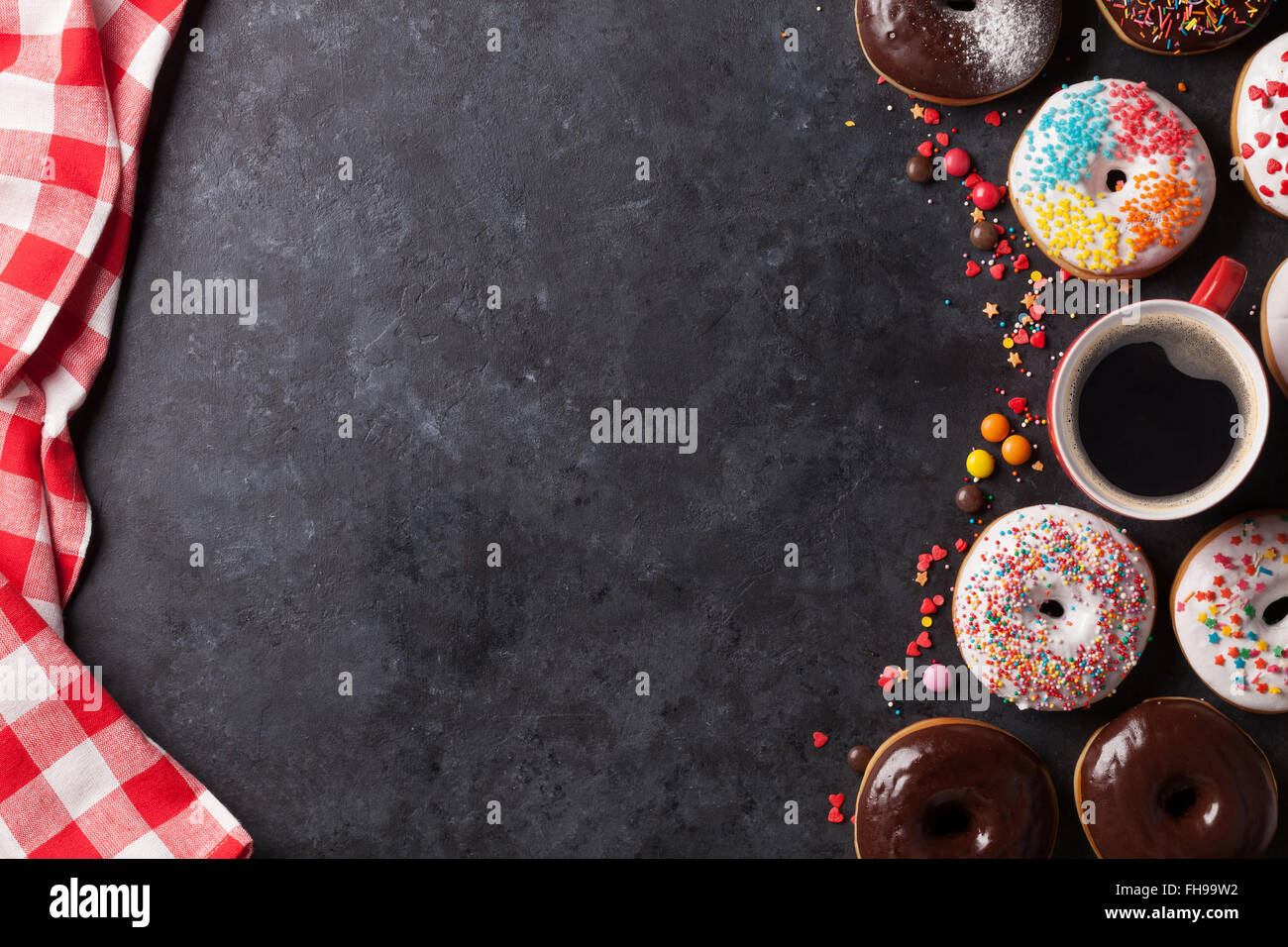 Donuts and coffee on stone table. Top view with copy space Stock Photo ...