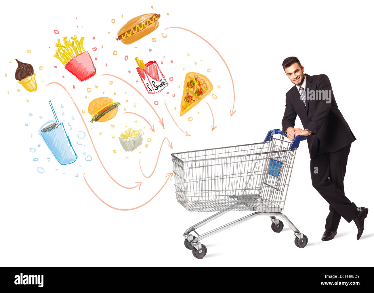 Man with shopping cart with toxic junk food Stock Photo