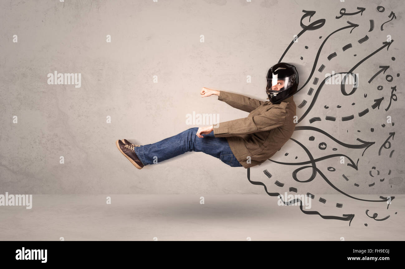 Funny man driving a flying vehicle with hand drawn lines after him Stock Photo