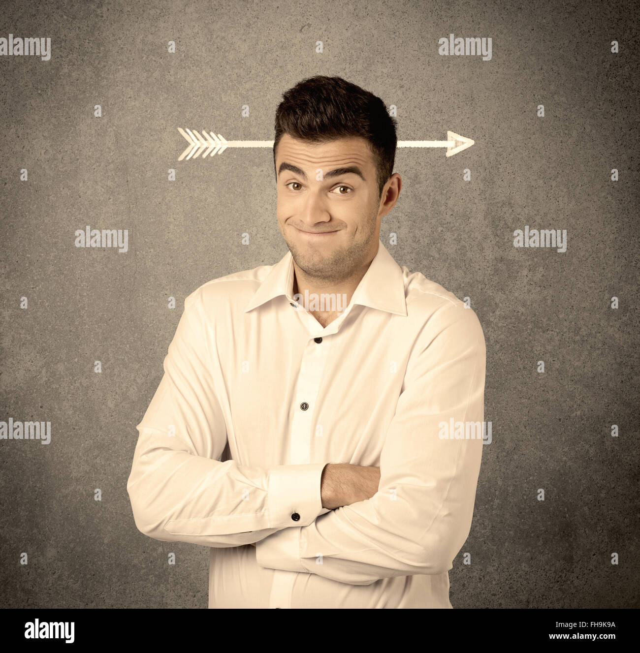 Young sales guy with arrow in the head Stock Photo - Alamy