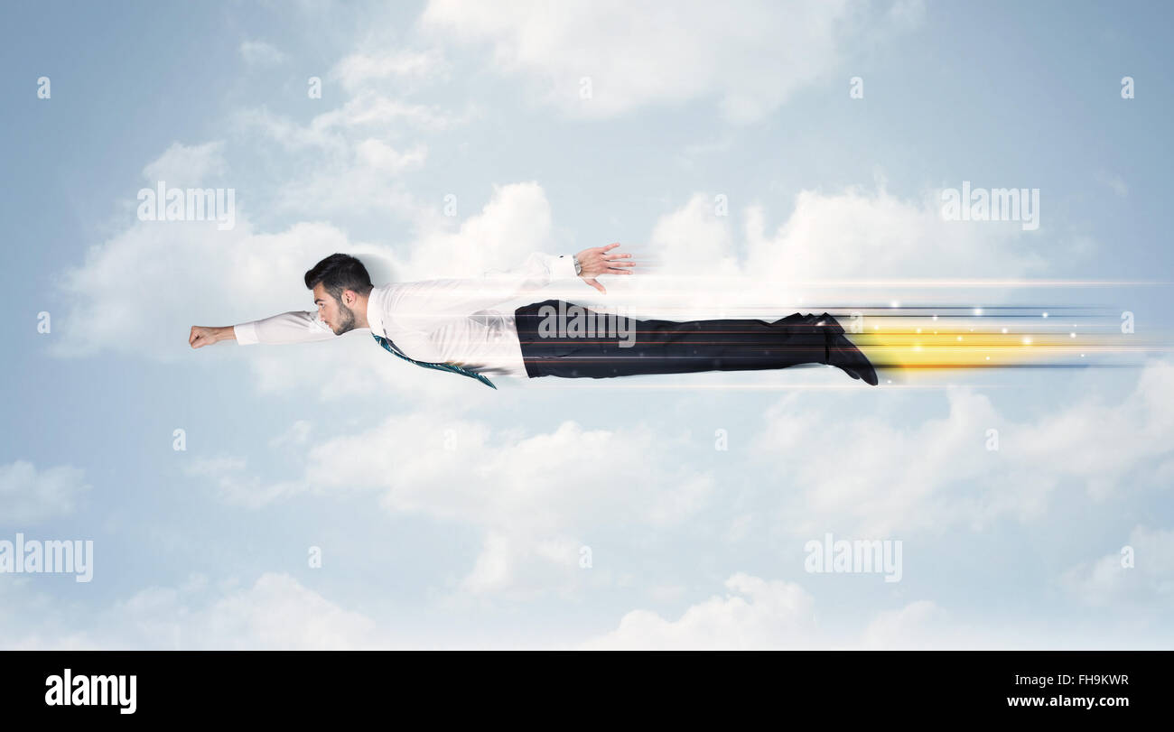 Happy business man flying fast on the sky between clouds Stock Photo ...