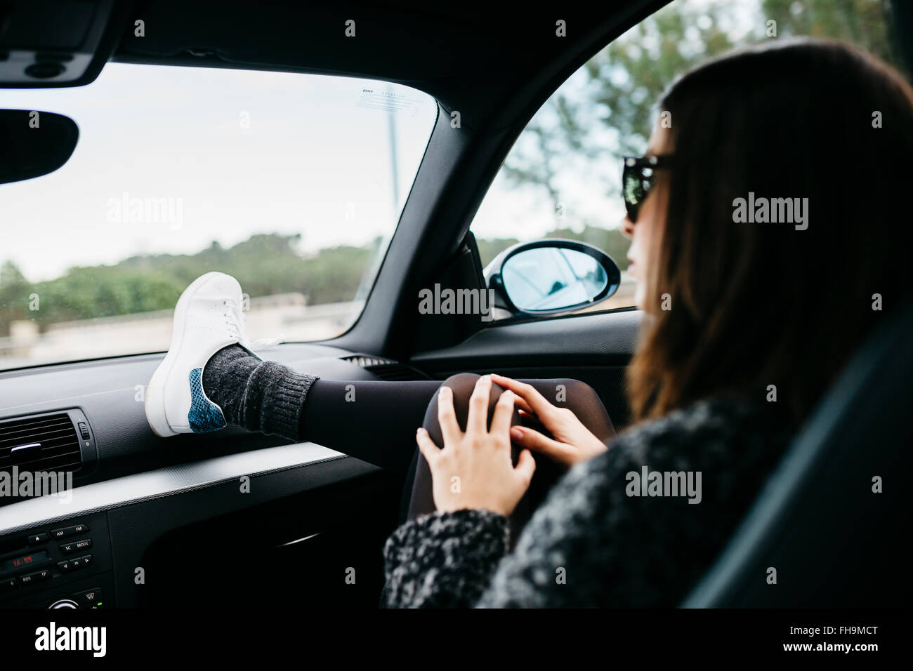 Feet on dashboard car on hires stock photography and images Alamy