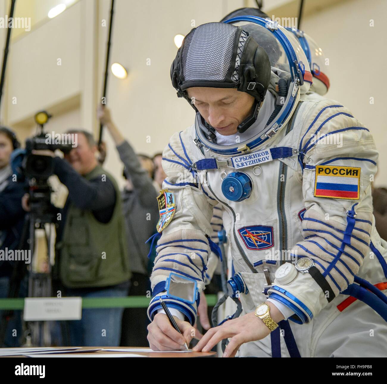 Star City, Russia. 24th February, 2016. International Space Station Expedition 47 backup crew member Russian cosmonaut Sergei Ryzhikov signs documents during Soyuz qualification exams at the Gagarin Cosmonaut Training Center February 24, 2016 in Star City, Russia. Stock Photo