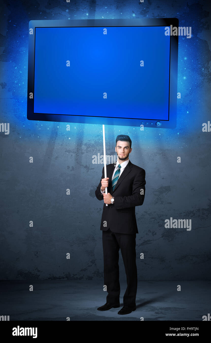 Businessman with shining tablet Stock Photo