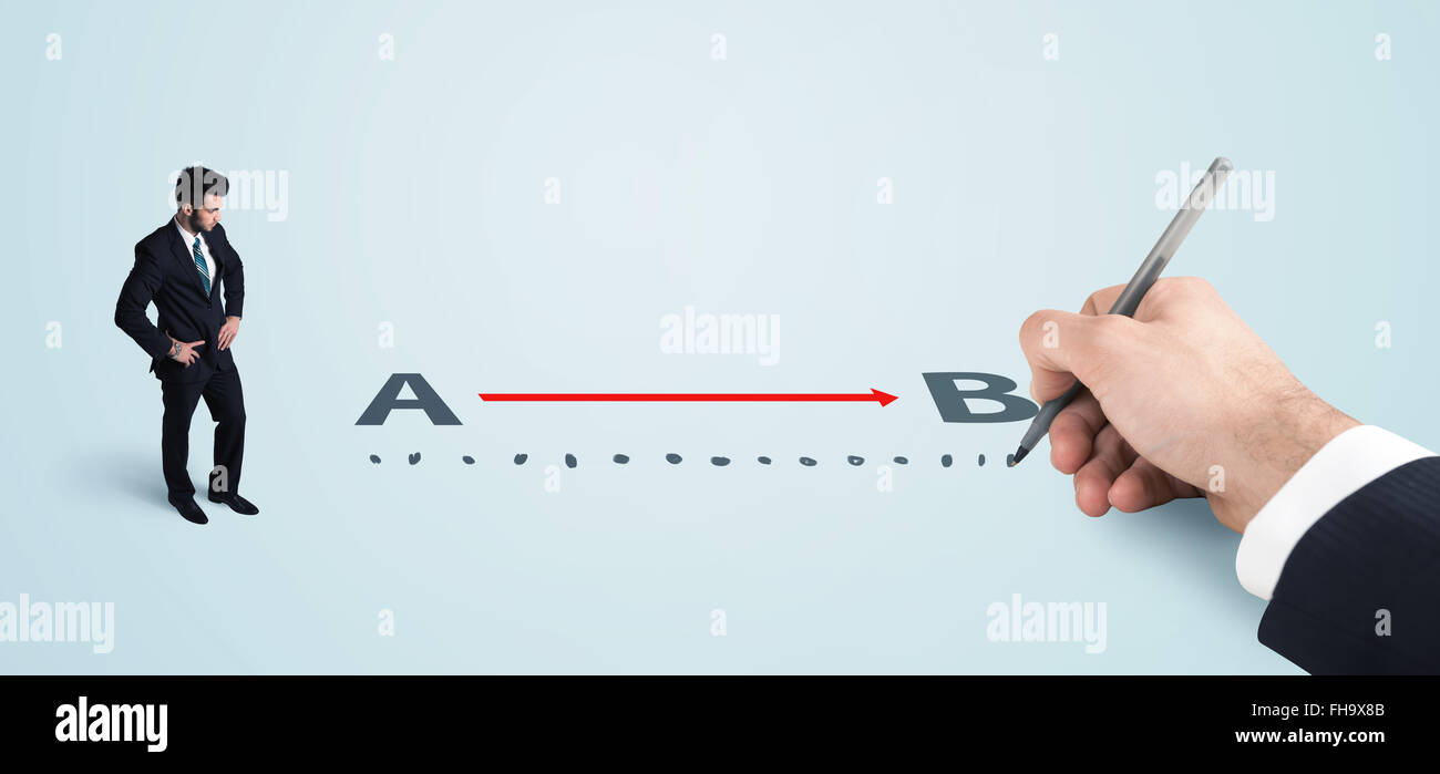 Businessman looking at red line from a to b drawn by hand Stock Photo