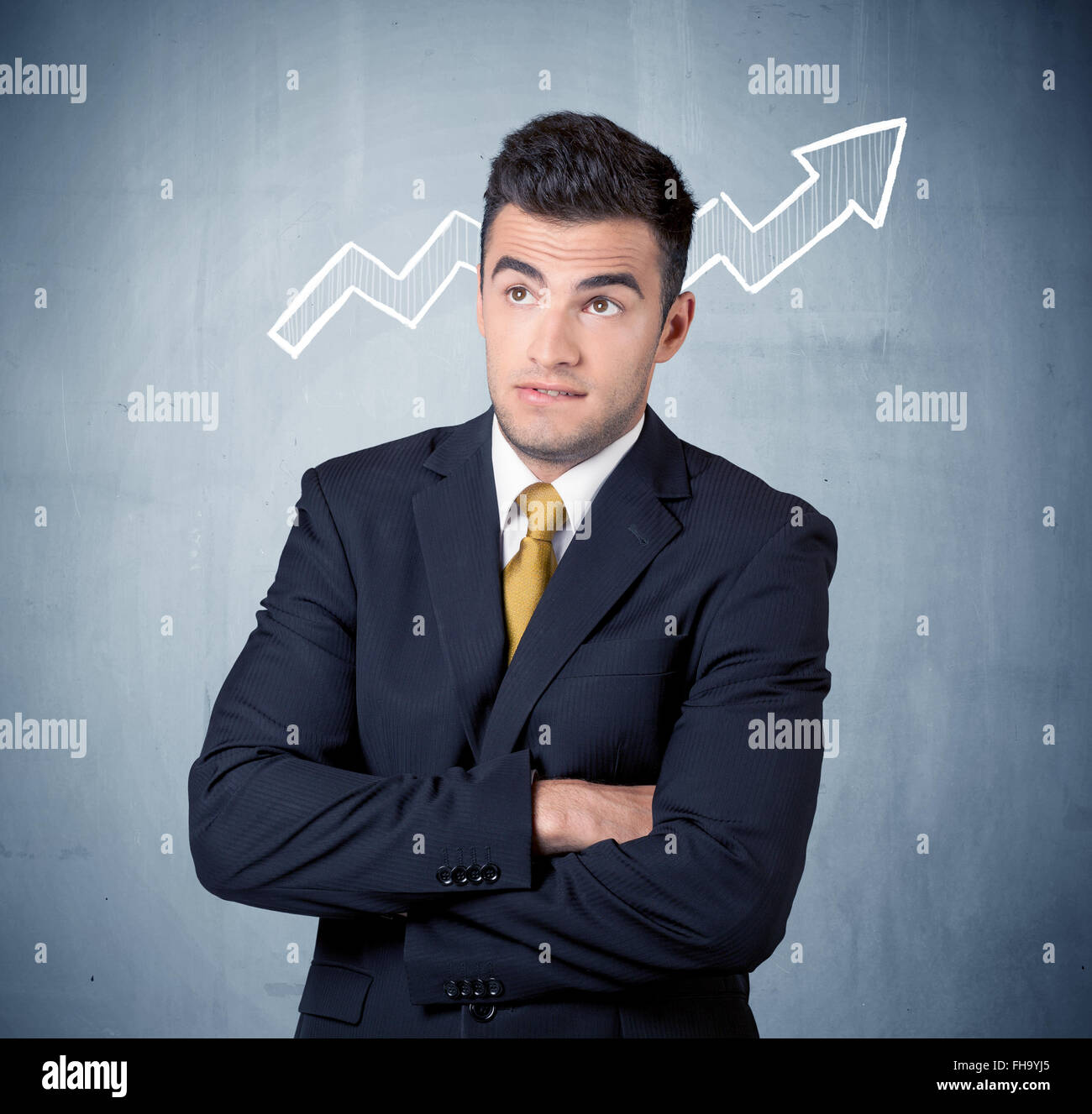 Smiling business guy with graph arrow Stock Photo