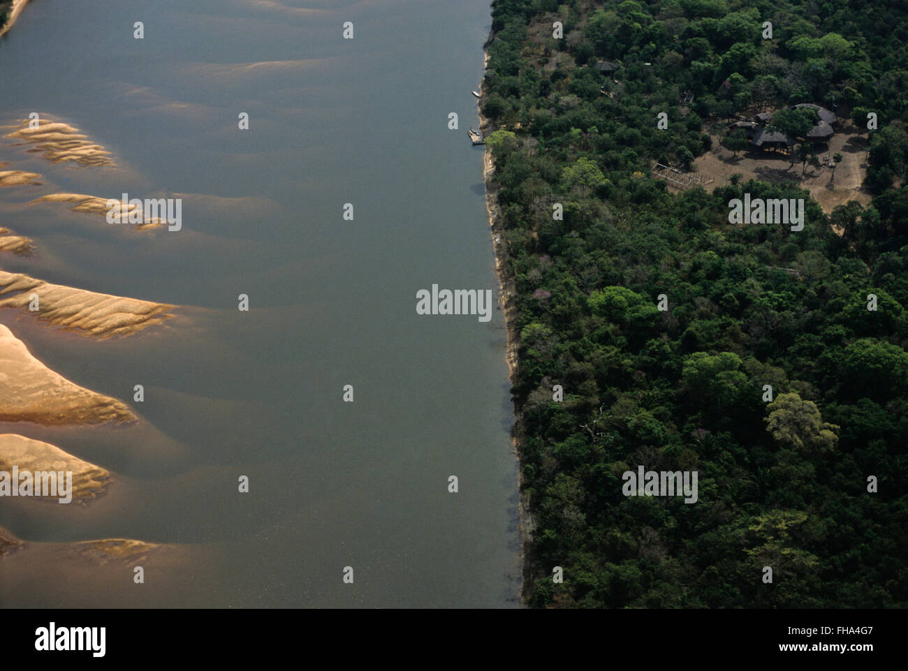 Aerial view of the Canguçu Research Center, bank of the Javaé river ( sand slopes ), at Ilha do Bananal ( Bananal island ), the world´s largest fluvial island, Amazon rainforest, Brazil. Stock Photo