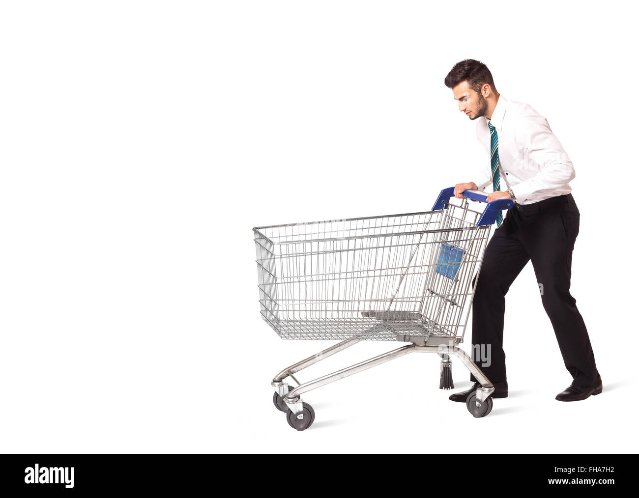 Businessman with shopping cart Stock Photo