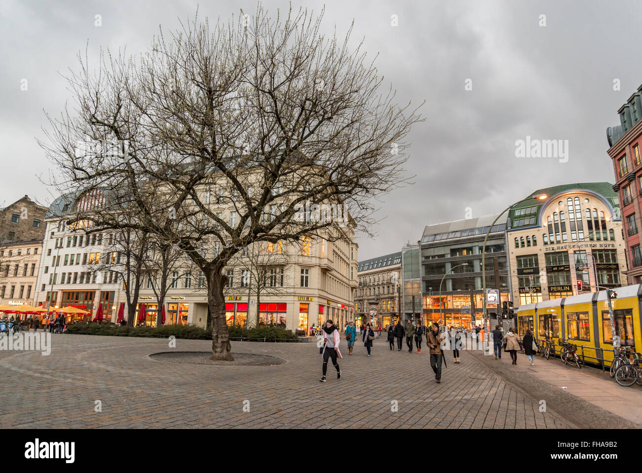 BERLIN - APRIL 1: People walk and enjoy the square in Hackescher Markt on April 1, 2015 in Berlin, Germany Stock Photo
