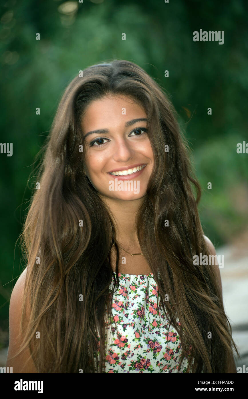 Happy young woman natural exterior setting Stock Photo
