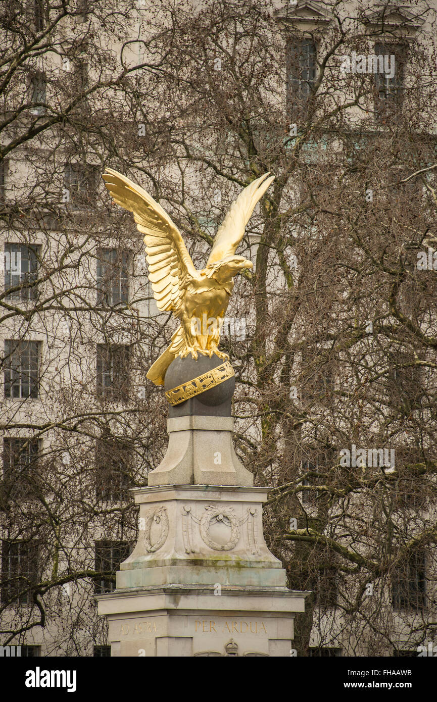 Statue of Golden Eagle of the RAF Memorial on the side of the River Thames in London alongside the Ministry of Defence building Stock Photo