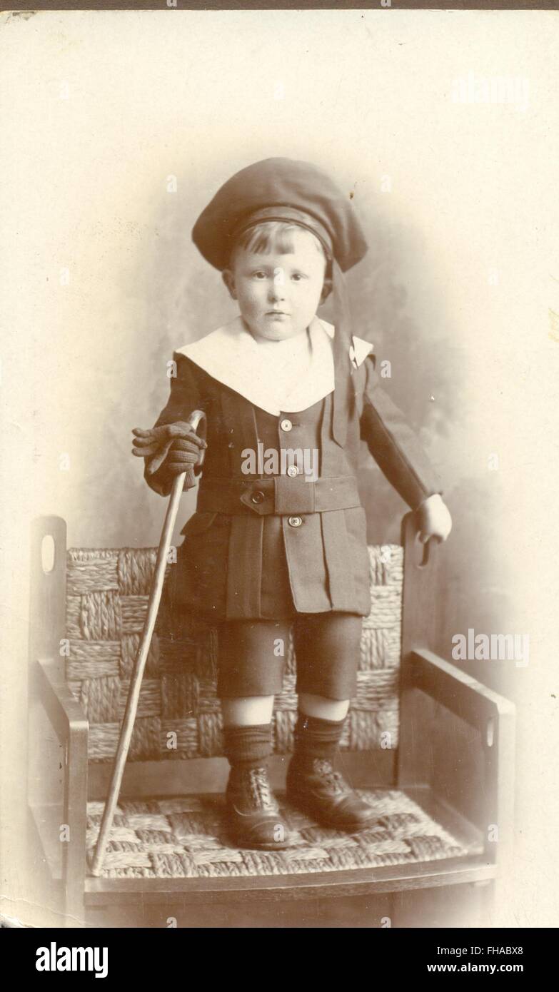 Portrait postcard of boy in his first suit Stock Photo Alamy