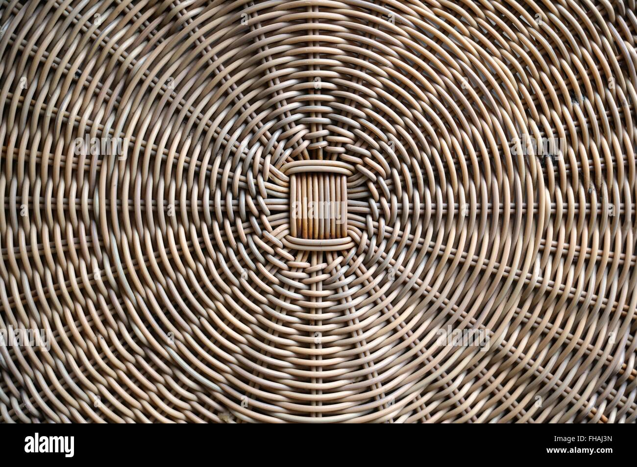 Woven wicker textured background Stock Photo - Alamy