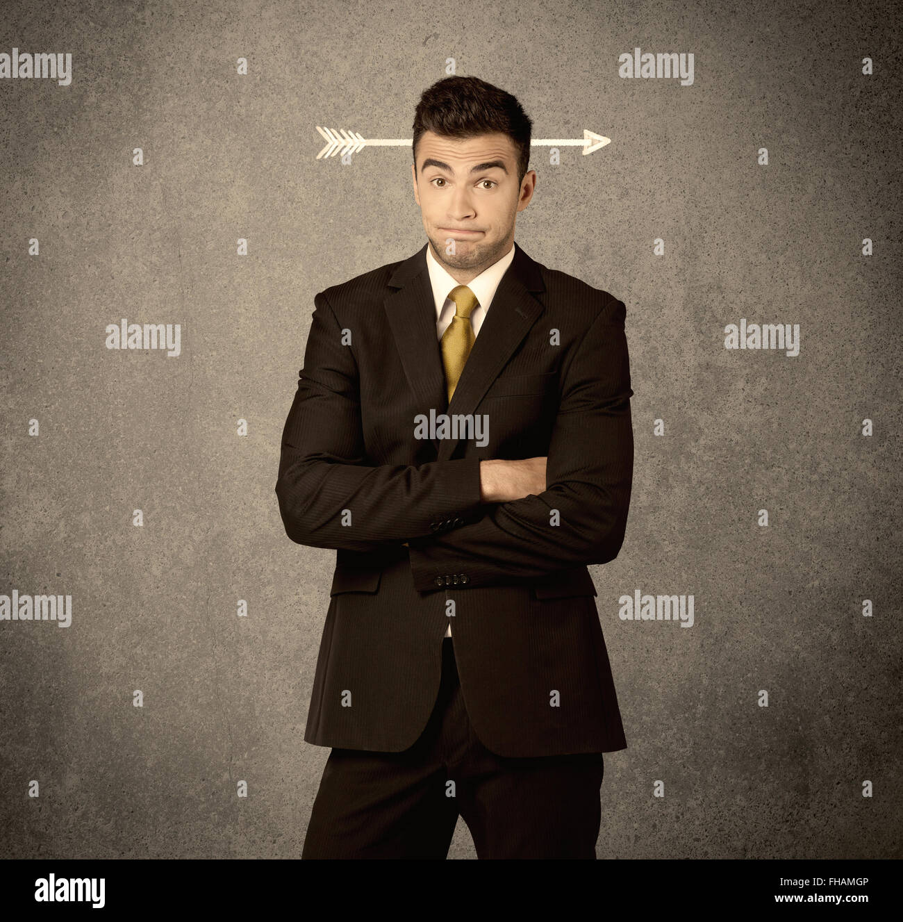 Young sales guy with arrow in the head Stock Photo - Alamy
