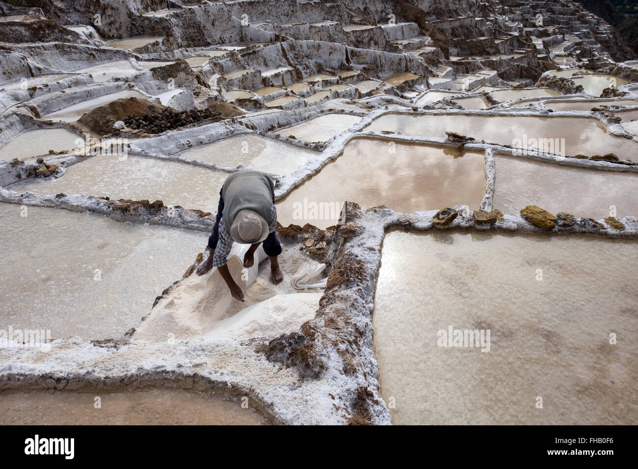Salt mines of Inca times in Maras community in the Sacred Valley. Stock Photo