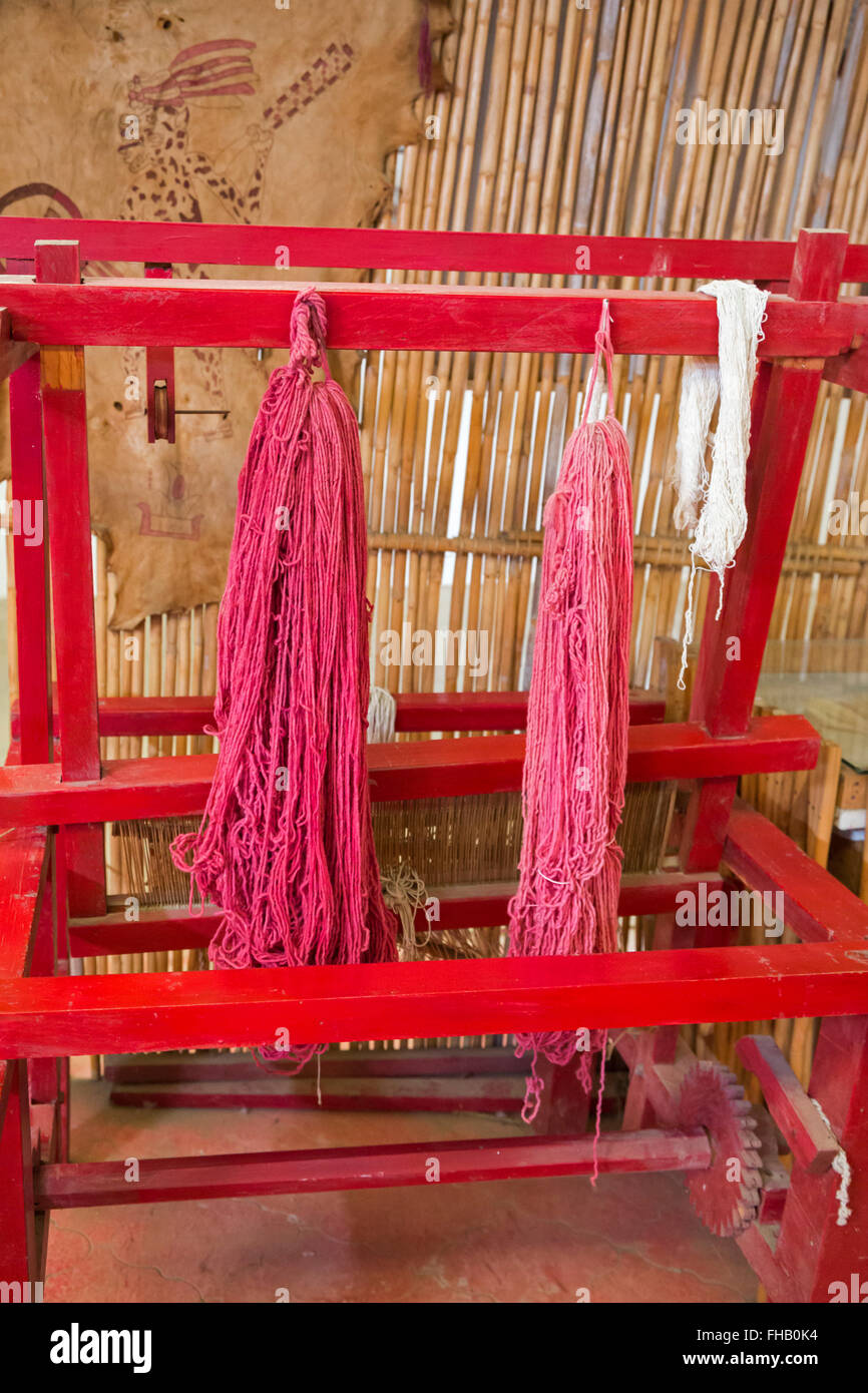 San Bartolo Coyotepec, Oaxaca, Mexico - Yarn colored with the natural carmine dye made from the cochineal bug. Stock Photo