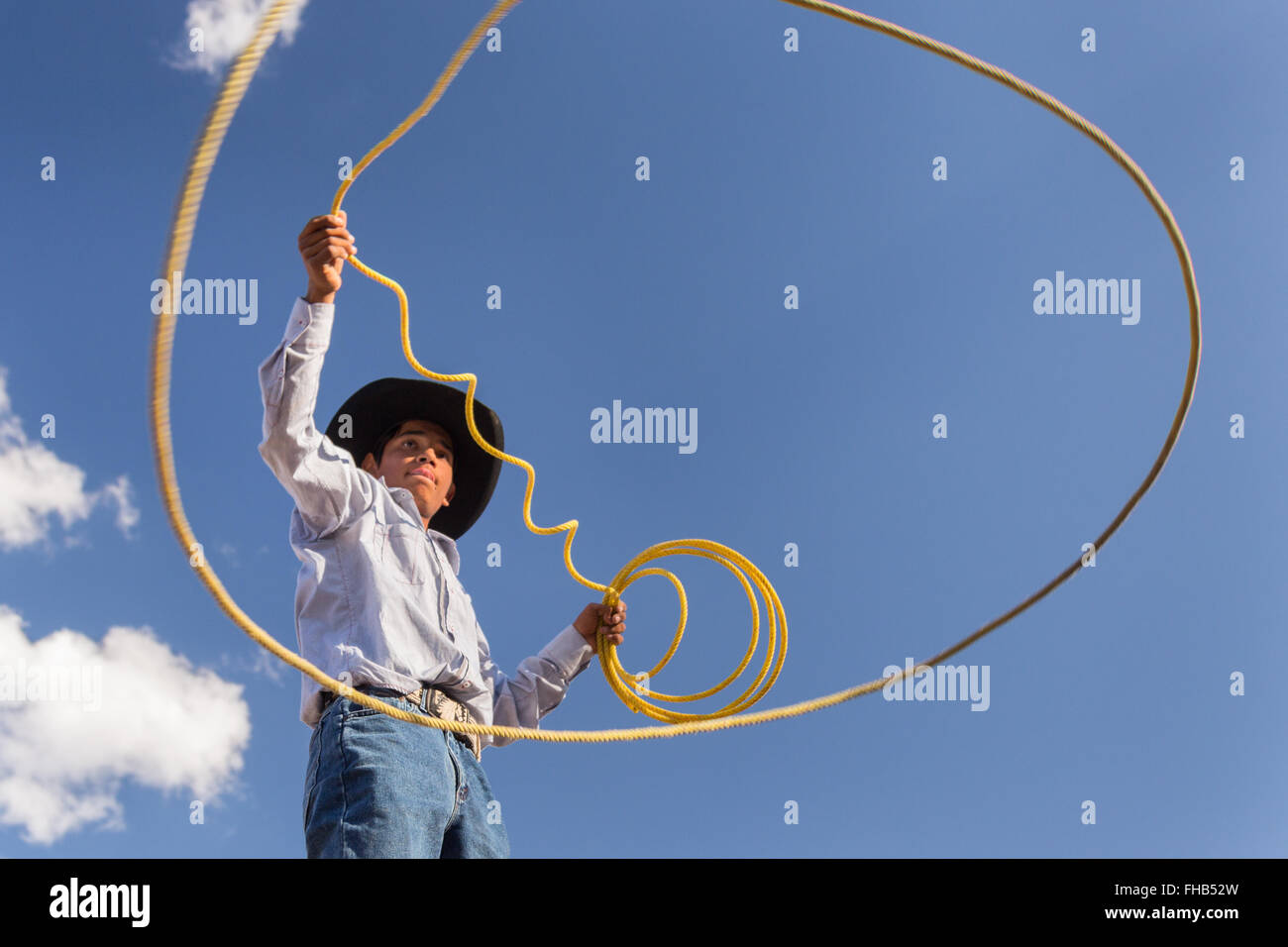 Charro Rodeo Ropes A Mexican charro or cowboy practices roping skills on his horse before ...