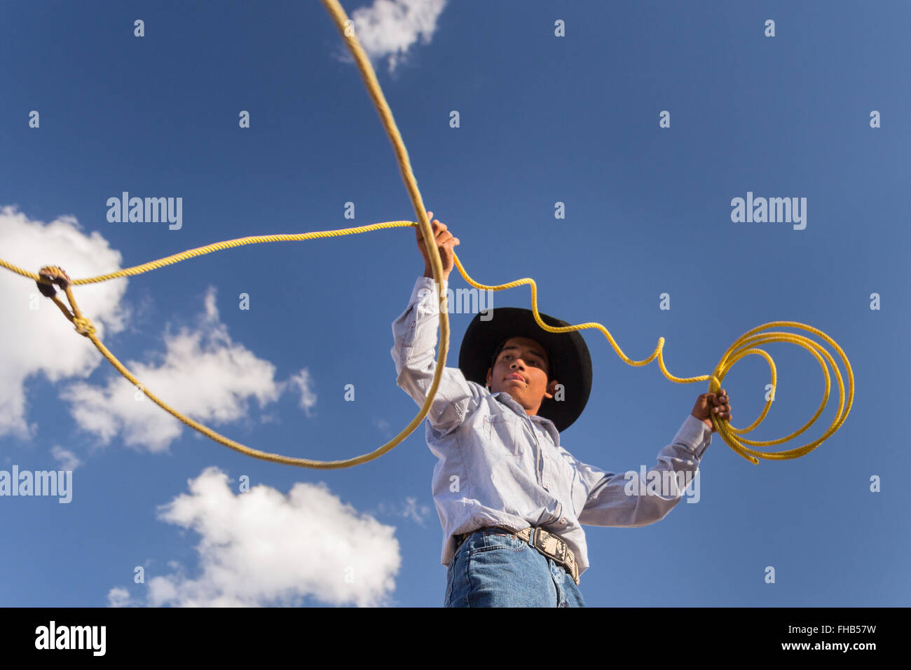 Charro Rodeo Ropes A Mexican charro or cowboy practices roping skills on his horse before ...