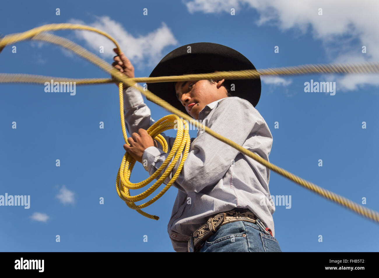Charro Rodeo Ropes A Mexican charro or cowboy practices roping skills on his horse before ...