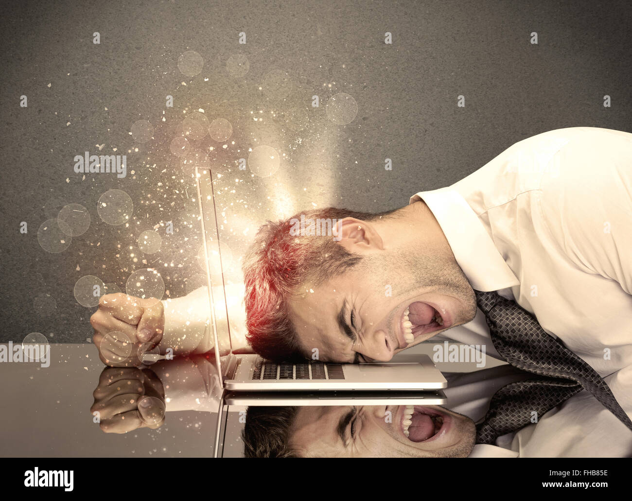 Angry businessman lights keyboard hi-res stock photography and images ...