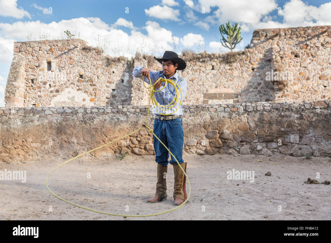 Mexican Ranch Roping A Mexican charro or cowboy practices roping skills at a hacienda ranch ...