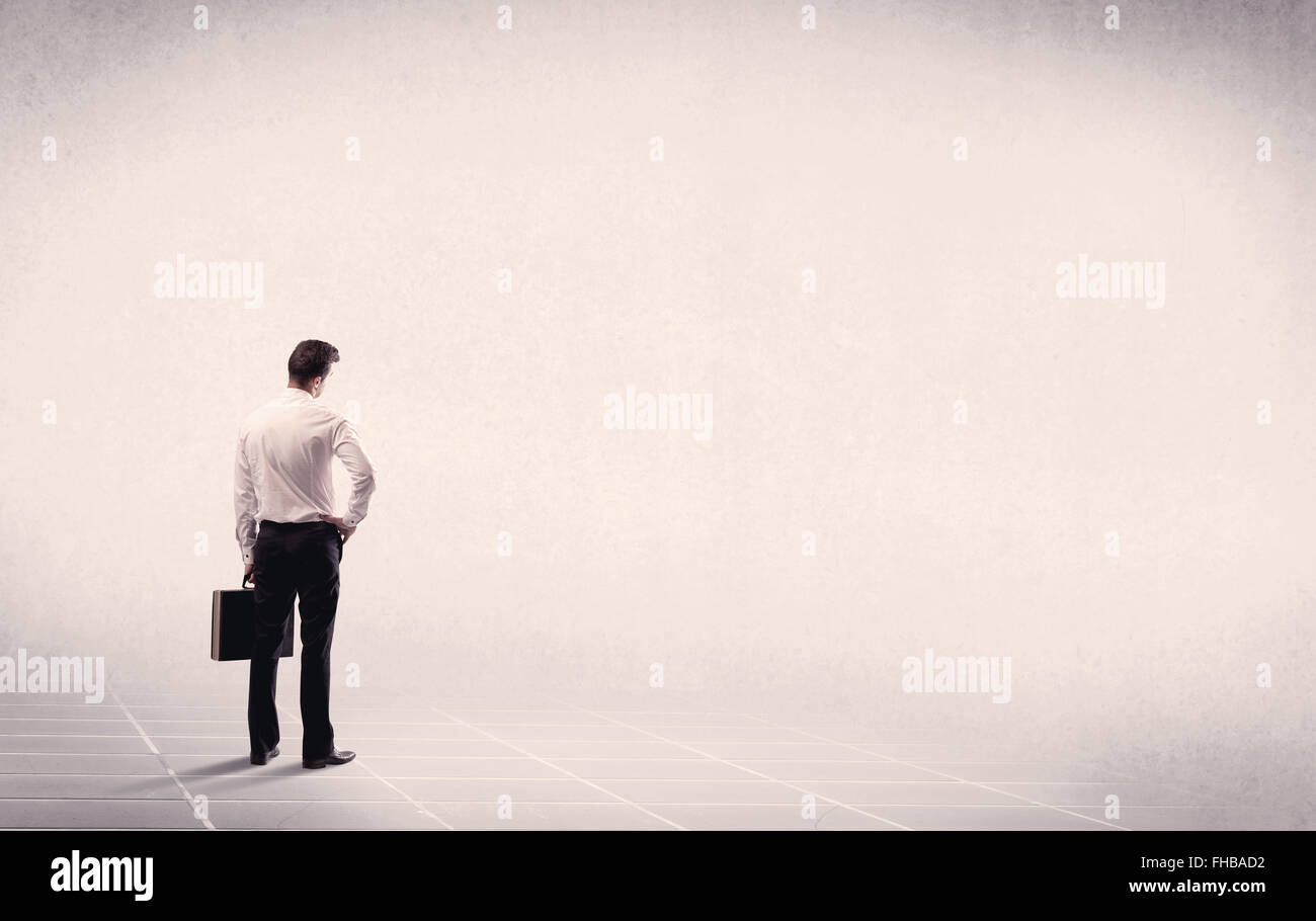 Business person standing in empty space Stock Photo - Alamy