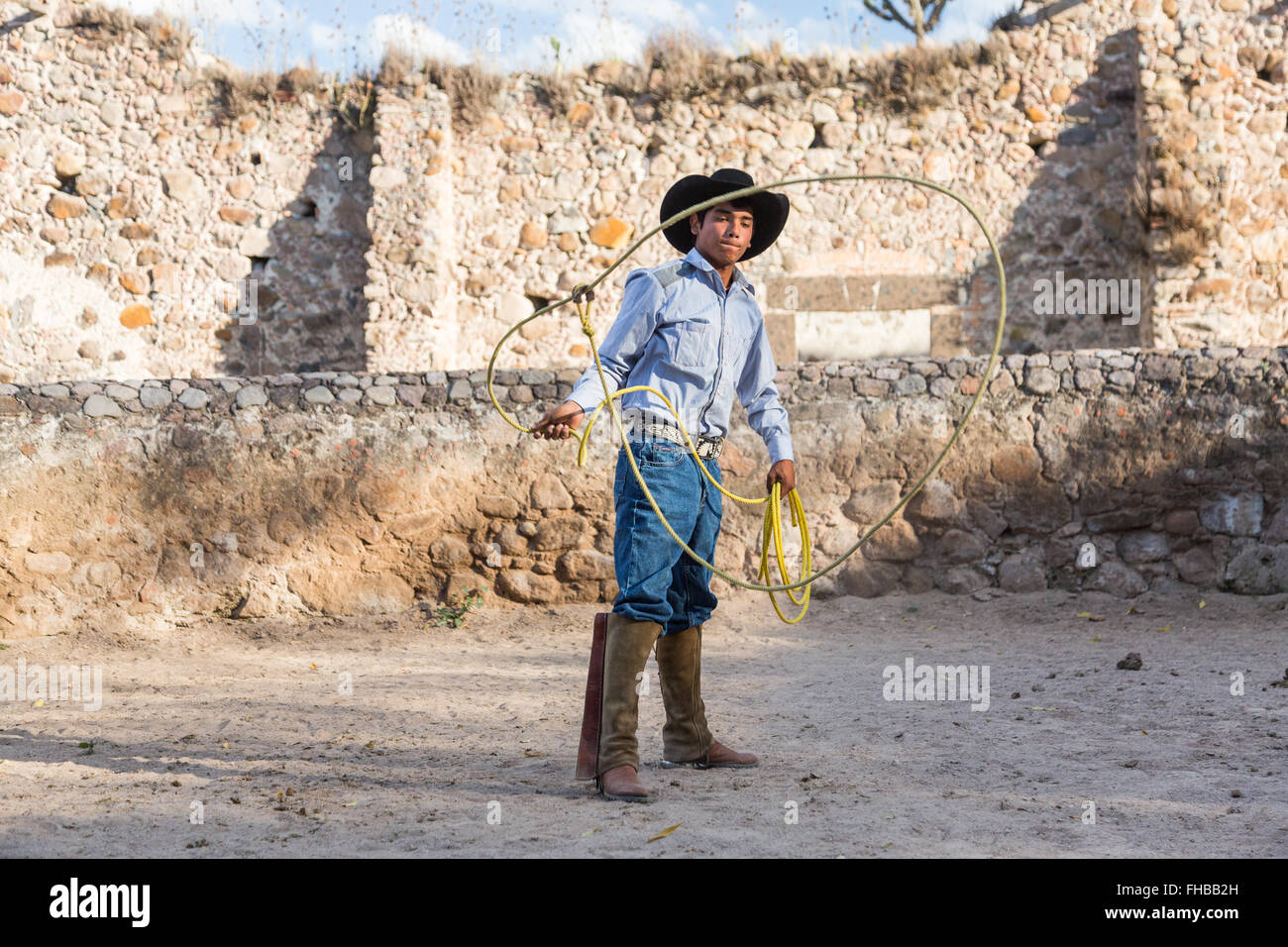Charro Rodeo Ropes A Mexican charro or cowboy practices roping skills at a hacienda ranch ...
